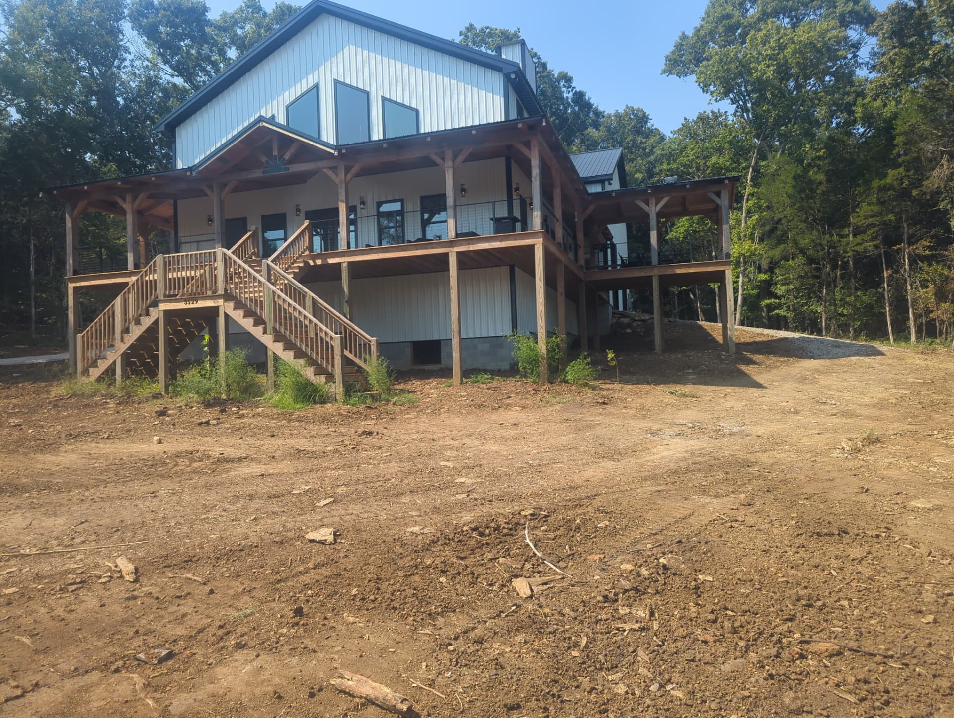 Completed functional subgrade around new barndominium after drainage grading in Columbia Tennessee